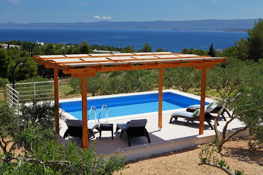 Holiday Homes Oliva Bol Chambre photo