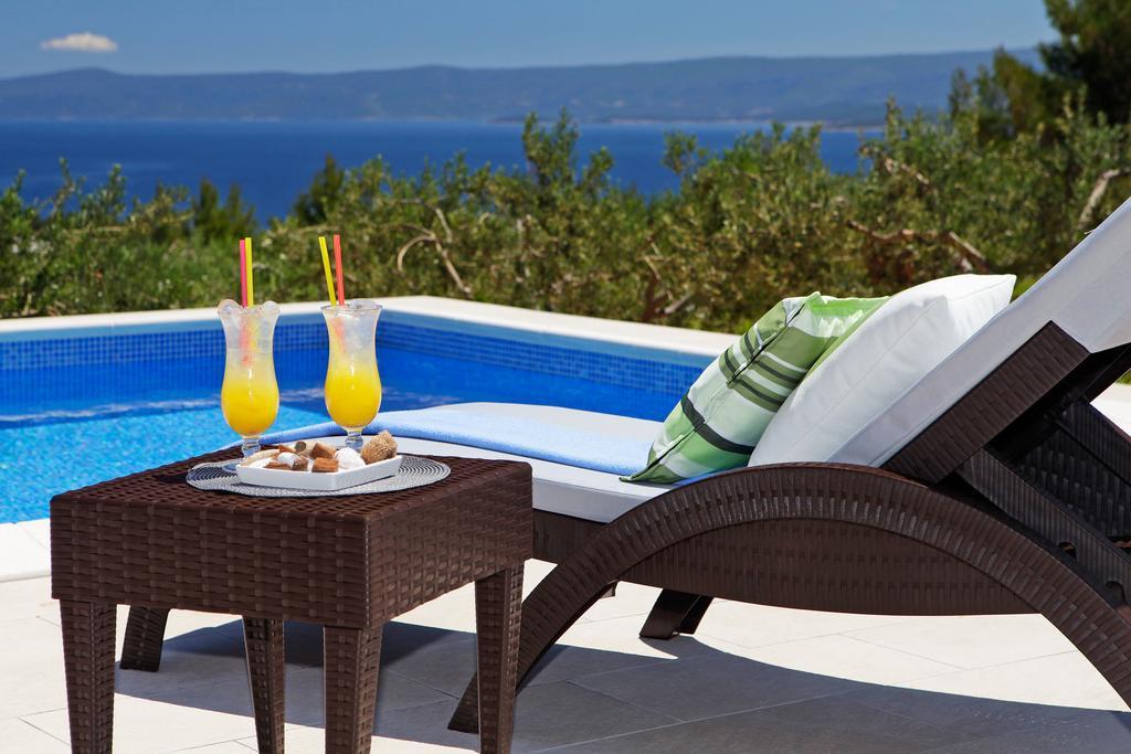 Holiday Homes Oliva Bol Chambre photo