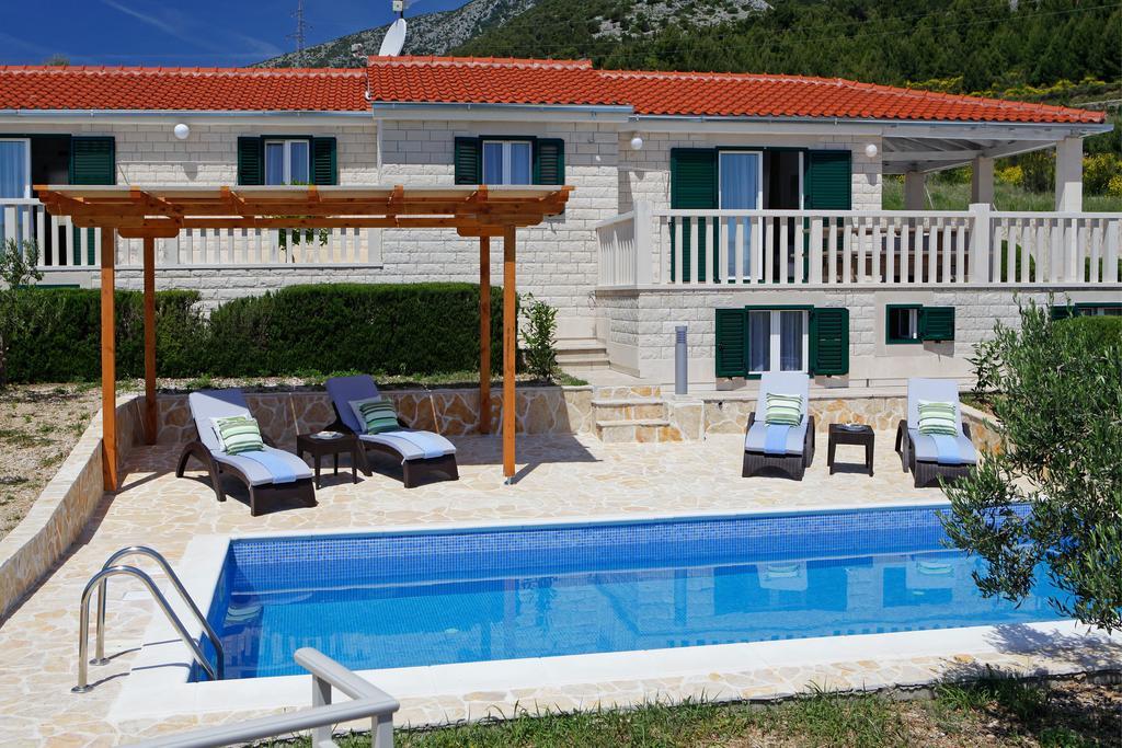 Holiday Homes Oliva Bol Chambre photo