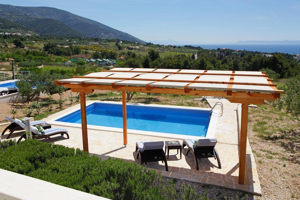 Holiday Homes Oliva Bol Chambre photo