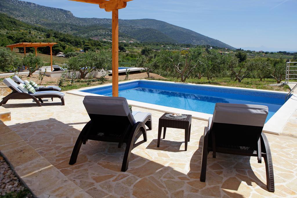 Holiday Homes Oliva Bol Chambre photo