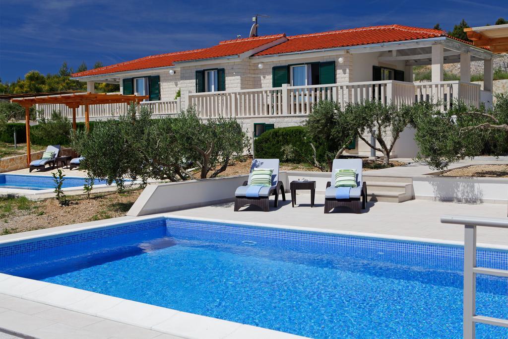 Holiday Homes Oliva Bol Chambre photo