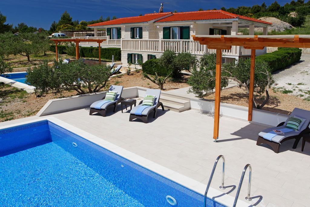 Holiday Homes Oliva Bol Chambre photo