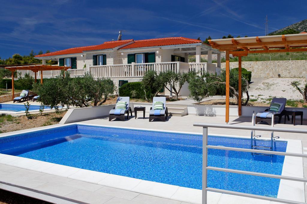 Holiday Homes Oliva Bol Chambre photo